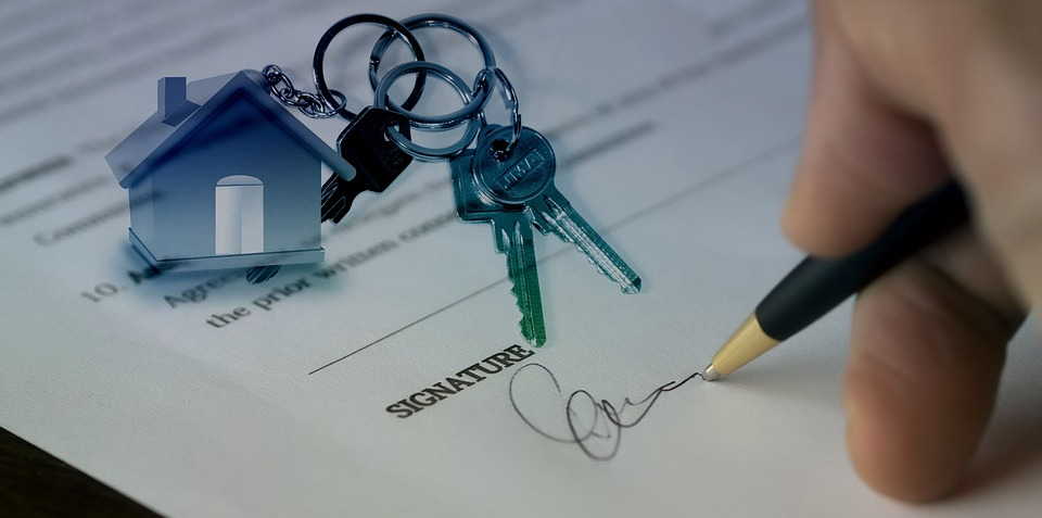 House, person signing a paper