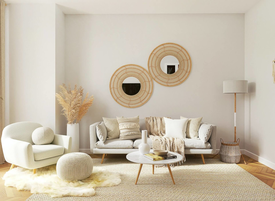White colored room with sofa, chari, table, mirrors on wall with large frames