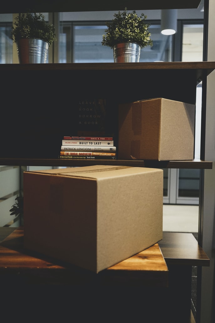 boxes in a bookshelf