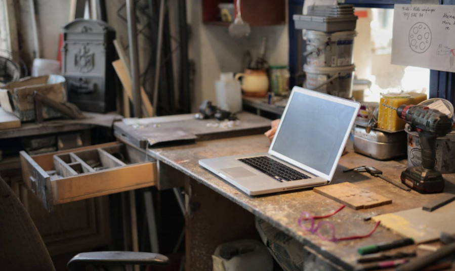 Laptop on a table in a workshop