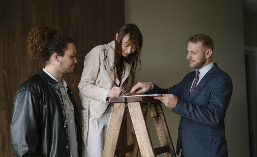 A couple moving into a new rental home in Australia