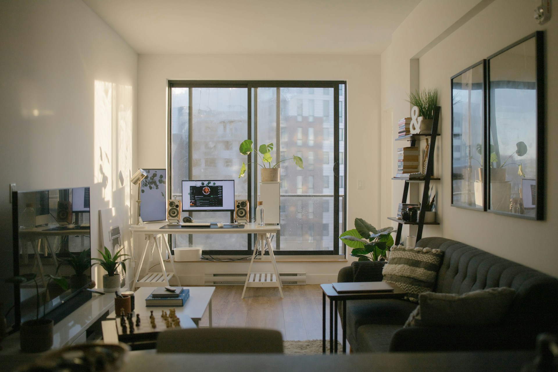 A modern apartment living room with large windows