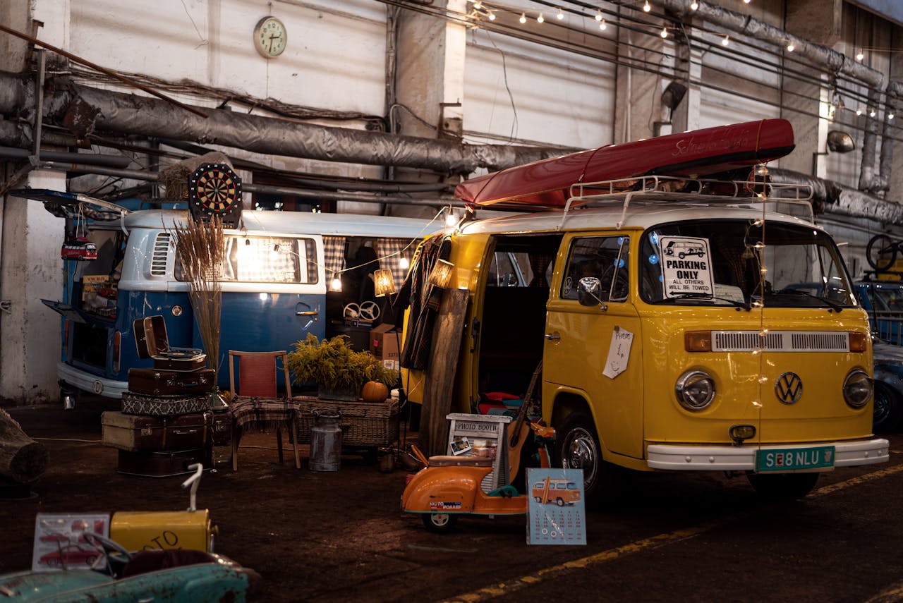Long-term vehicle storage facility with classic buses on display. Image via Pexels
