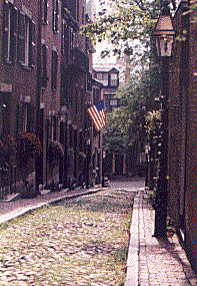 Brick building, cobblestone road in Beacon Hill, Boston MA