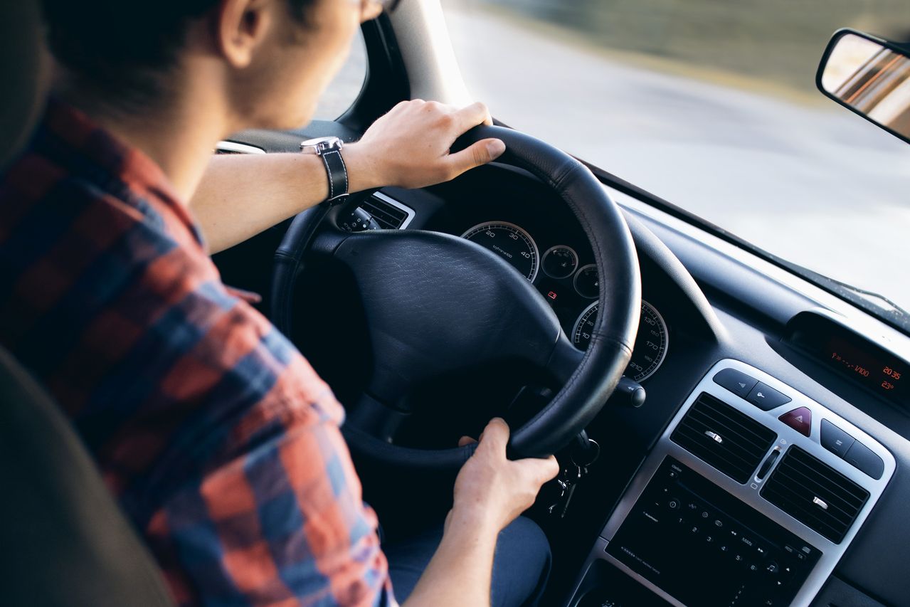 Man inside a vehicle. Image by Pexels