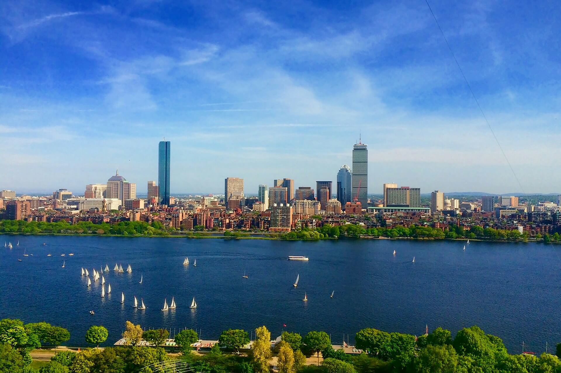 Sailing boats on the Charles River in Boston. Image by Unsplash