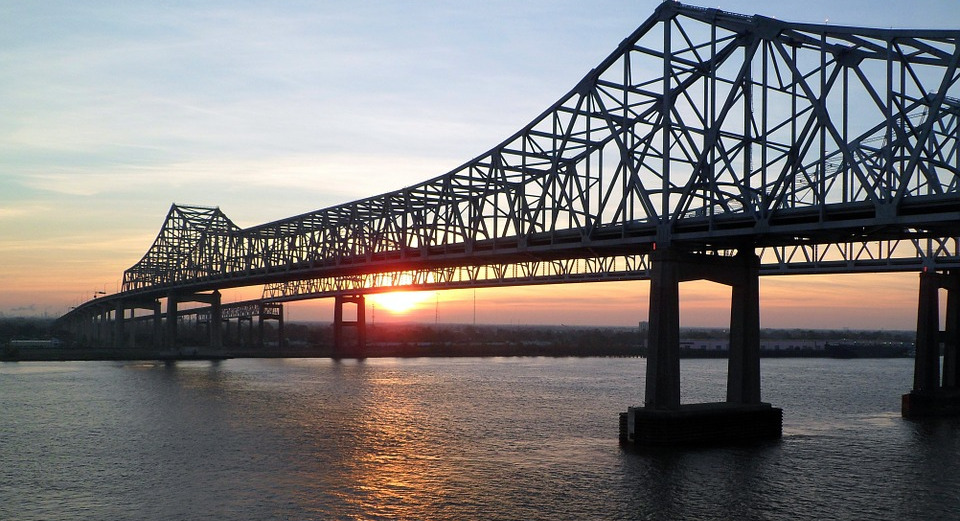 Mississippi bridge over water, beautiful sunrise