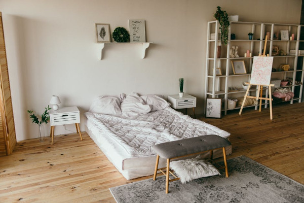 Bed, white wooden shelf
