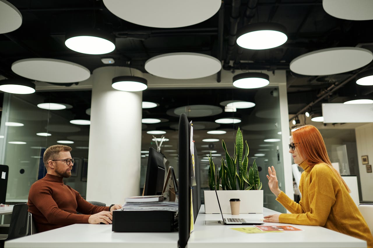 People working in an office. Image by Pexels