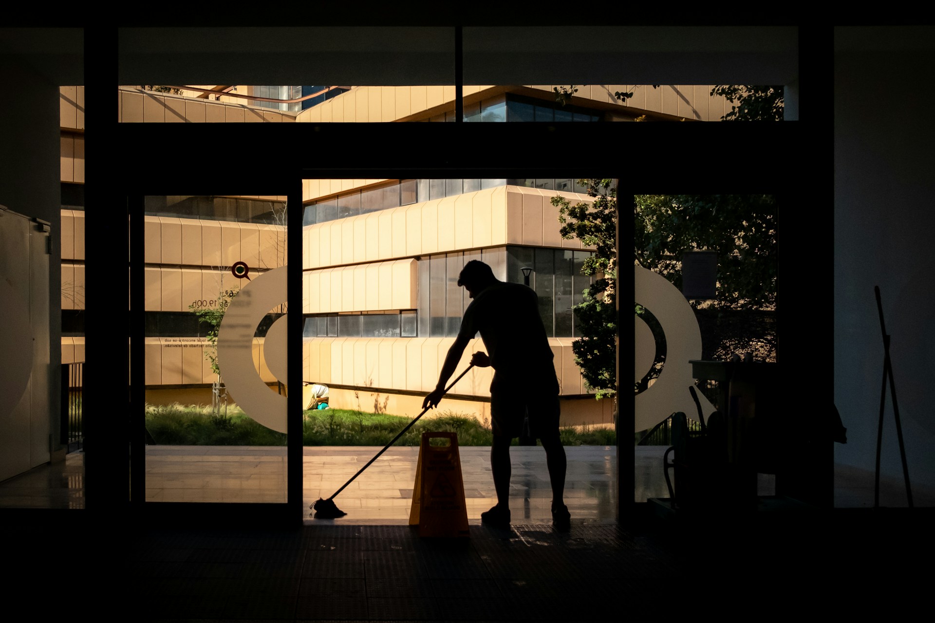 Person mopping. Image by Unsplash