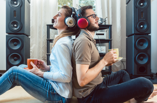 2 people listening to music