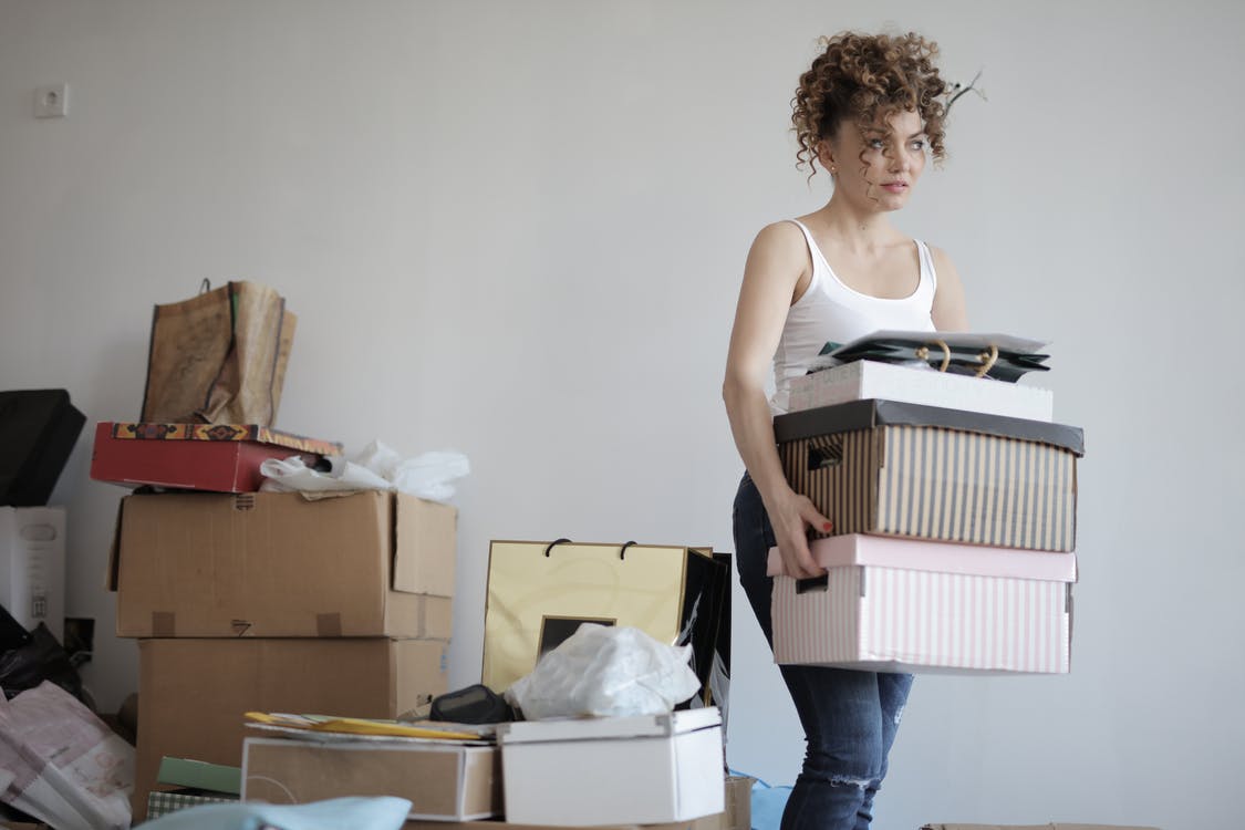 person carrying boxes