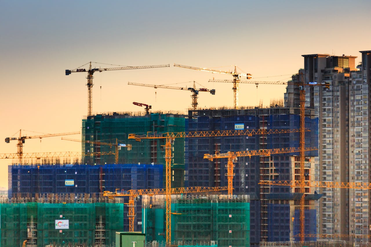 Construction site, cranes. Image by Pexels