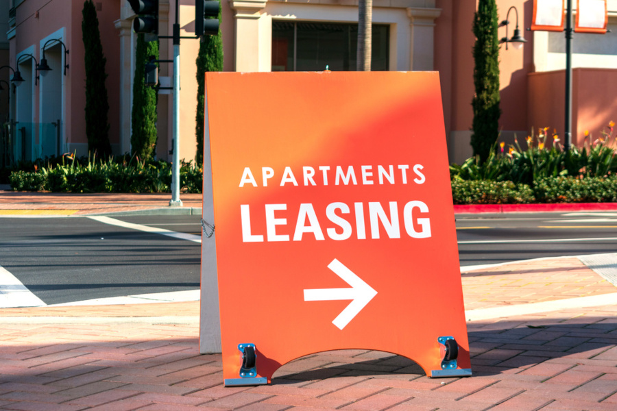 Orange Apartments Leasing sign