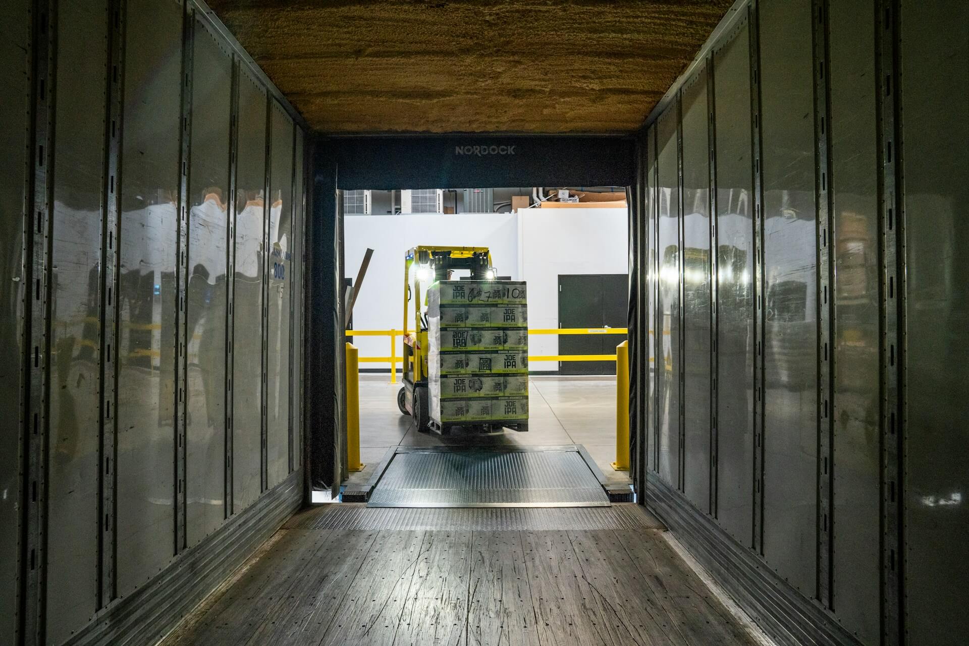 Forklift with a load. Image by Unsplash