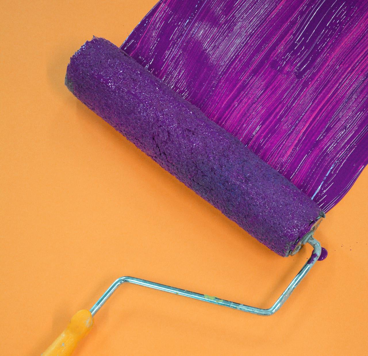 Painting purple over orange. Image by Pexels