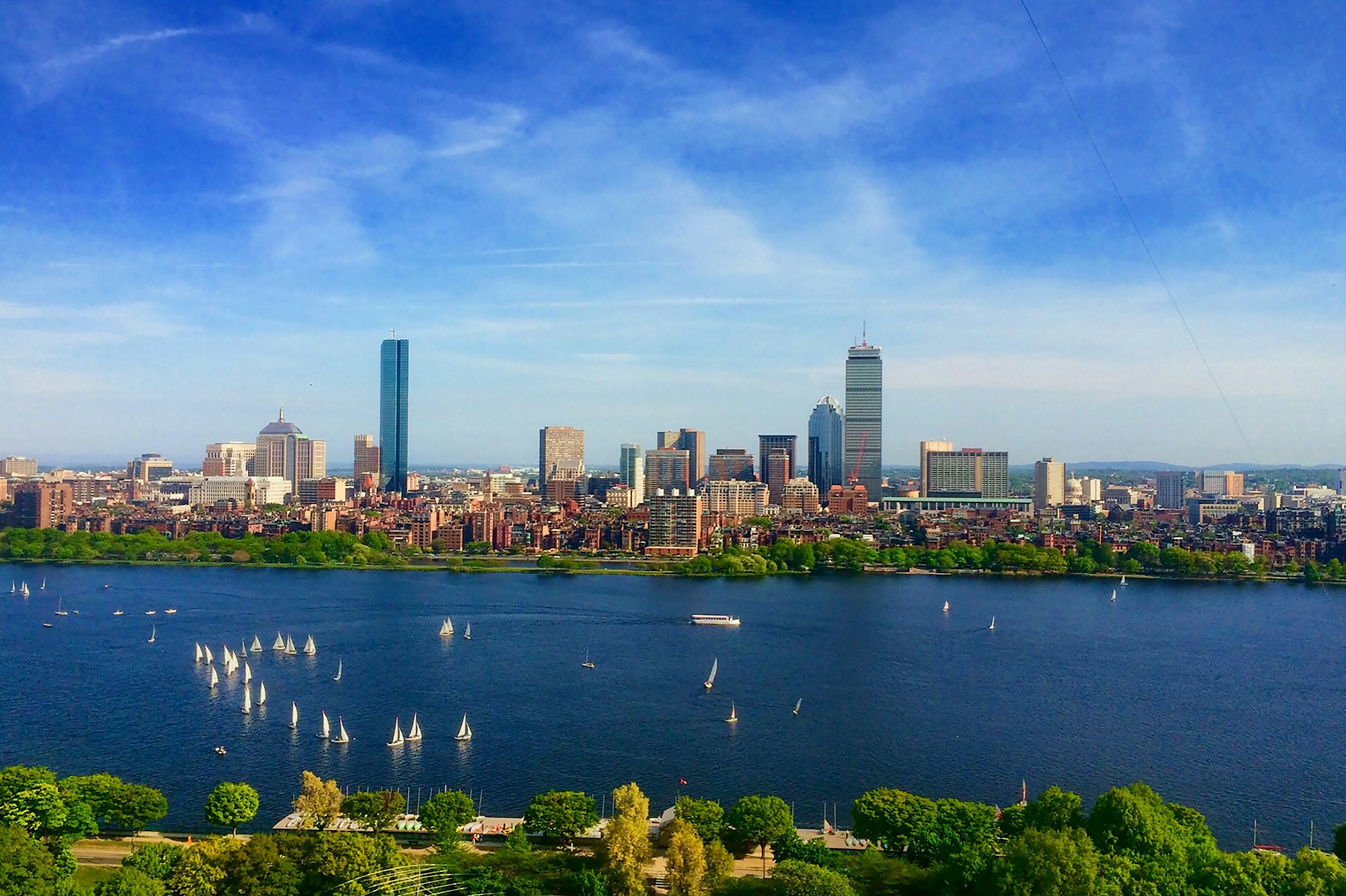 Boston skyline and waterfront representing the local home buying market. Image via Unsplash
