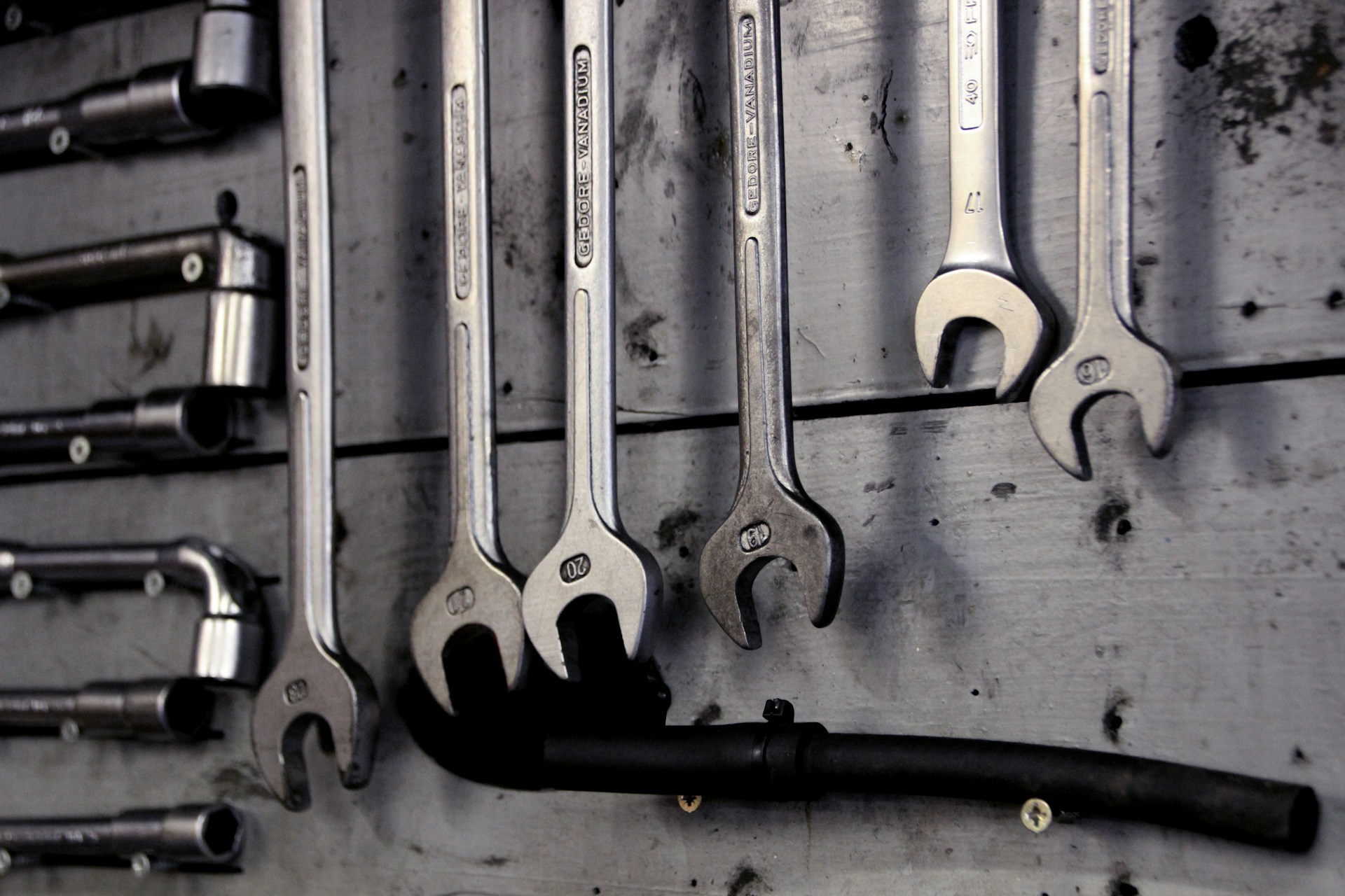 Tools hanging on a wall. Image by Unsplash