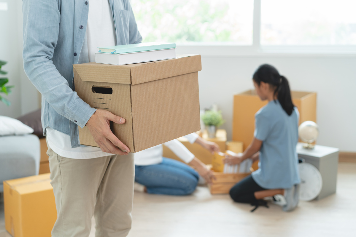 Person carrying a box