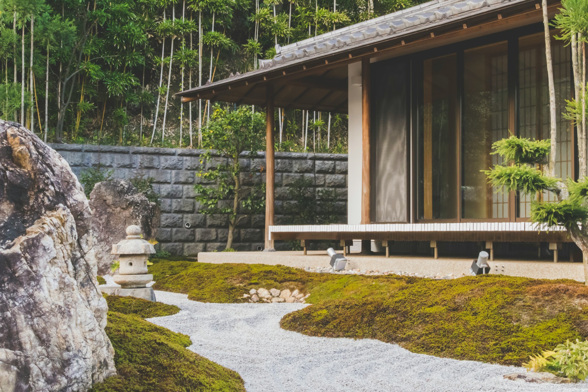 Garden, wooden house with glass sliding doors. Image by Usplash