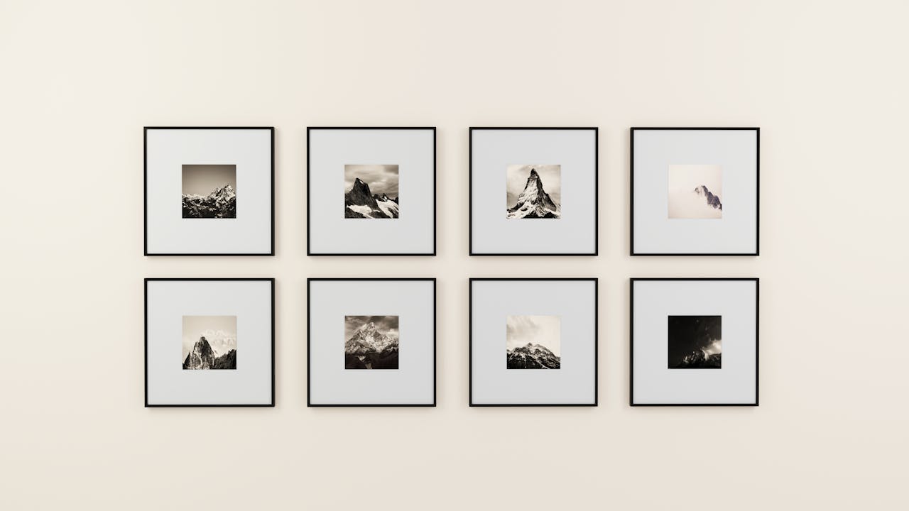 8 picture frames on a wall