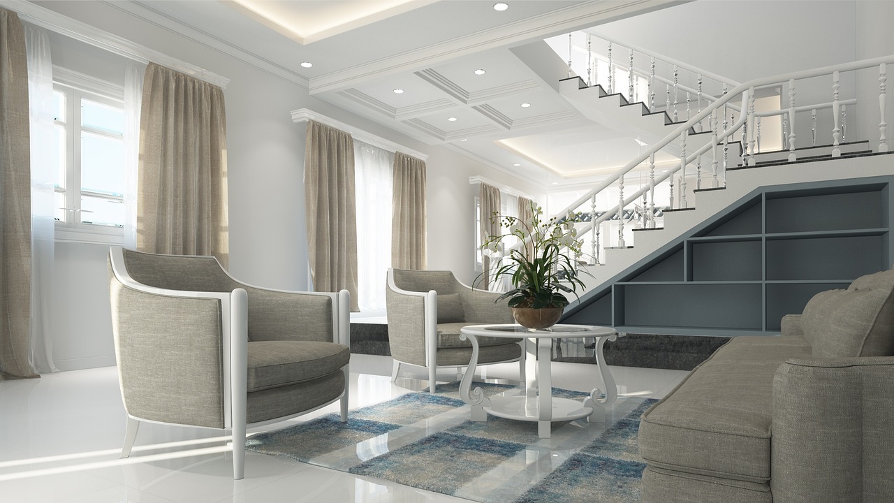 Modern light colored living room with a large staircase. Image by Pixabay