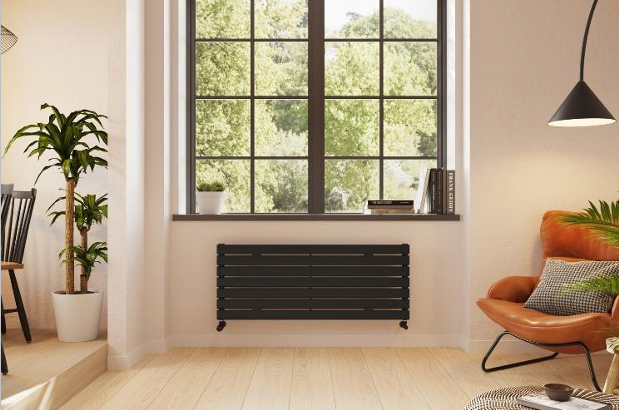 Modern livingroom, with radiator. Image from UK Radiators