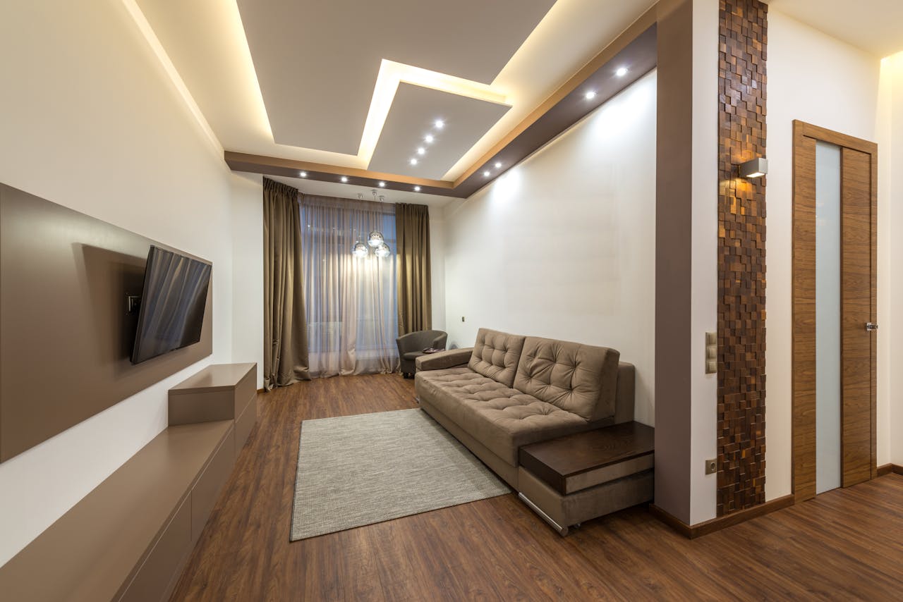 Livingroom, tv on wall. Image by Pexels