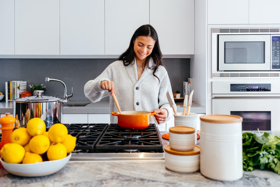 A girl cooking in the kitchen