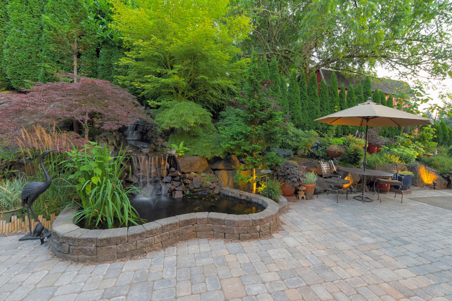 Backyard patio, pond and  waterfall