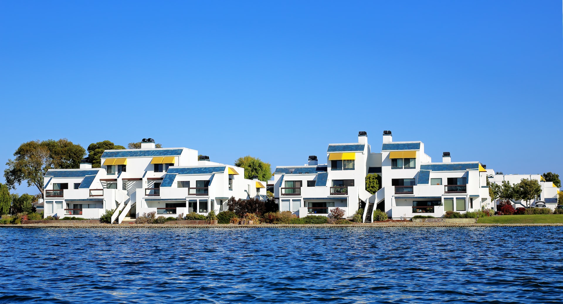 White townhouses on the water