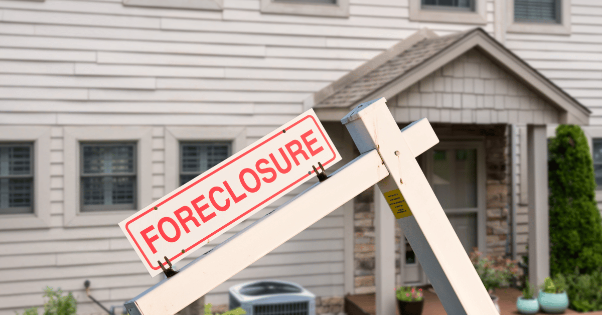 House with a foreclosure sign. Image by Canva Pro