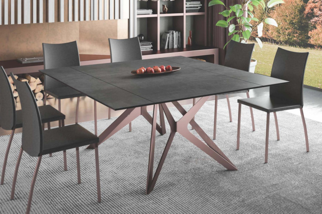 Modern square diningroom table with 6 chairs. Image by Roomservice360.com