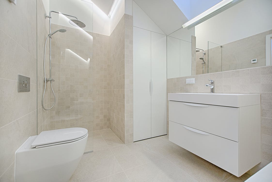 modern bathroom with white cabinets