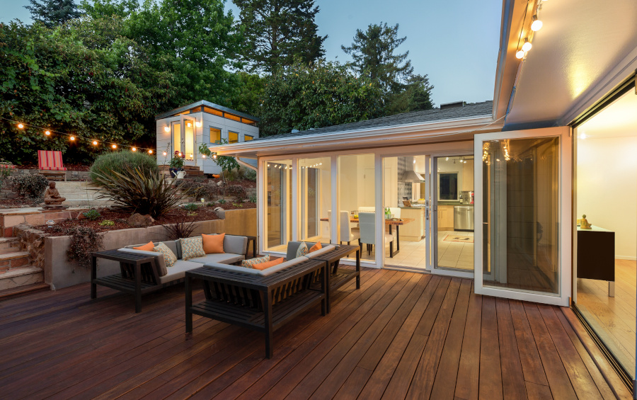 outdoor wood deck, furniture, white walls