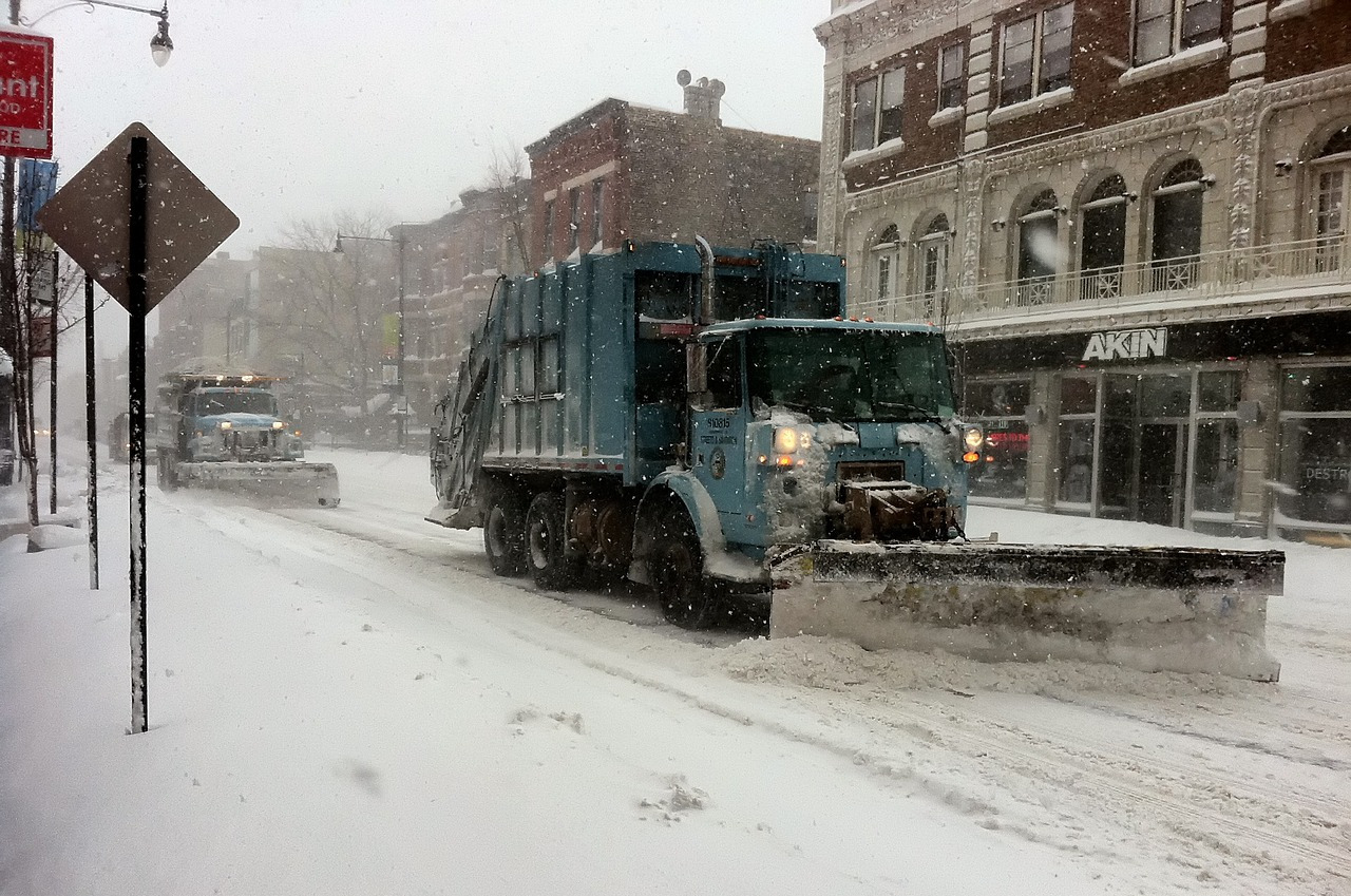 Large snowplows on a street in Chicago