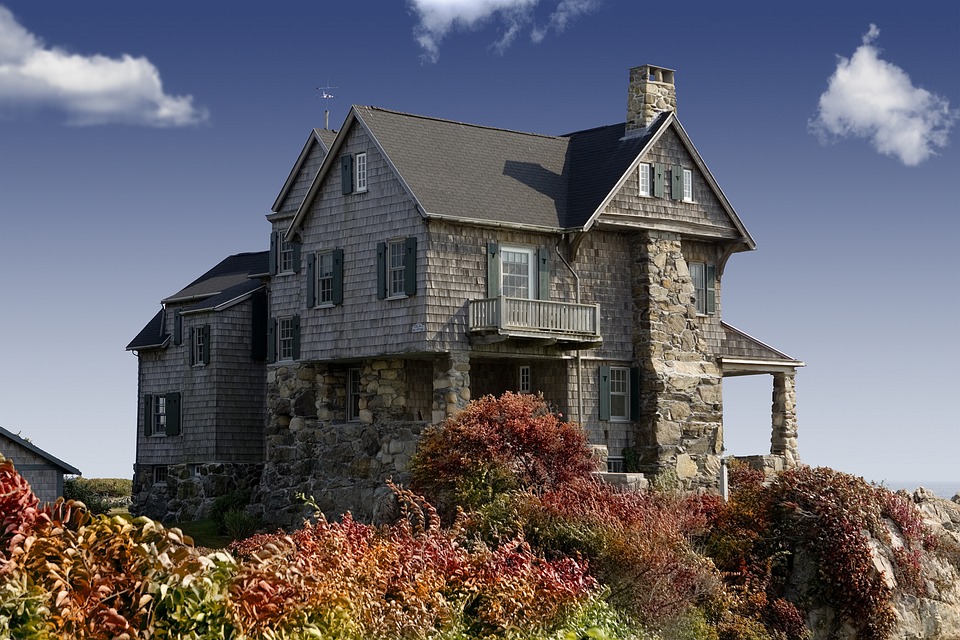 Stone and shingle grey house