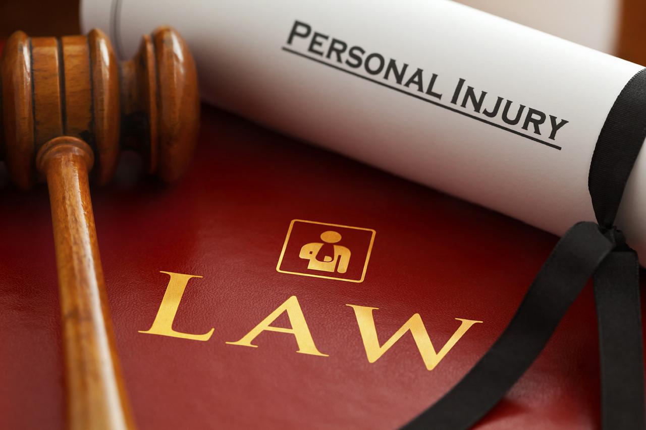 Personal injury, gavel, law book