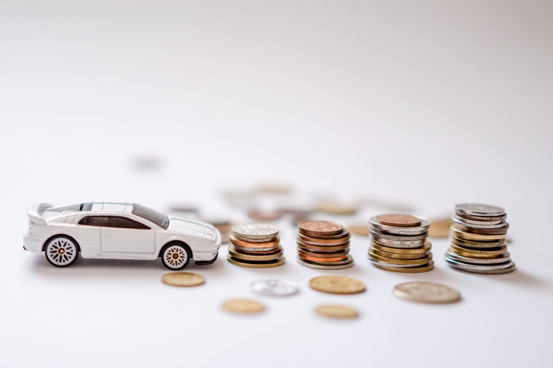 toy car coins in piles