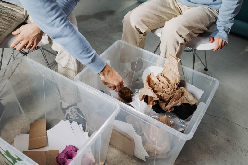 people sorting boxes