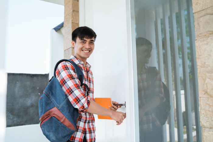 Person opening a door