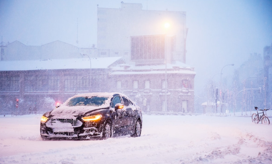 Car in the snow on the street