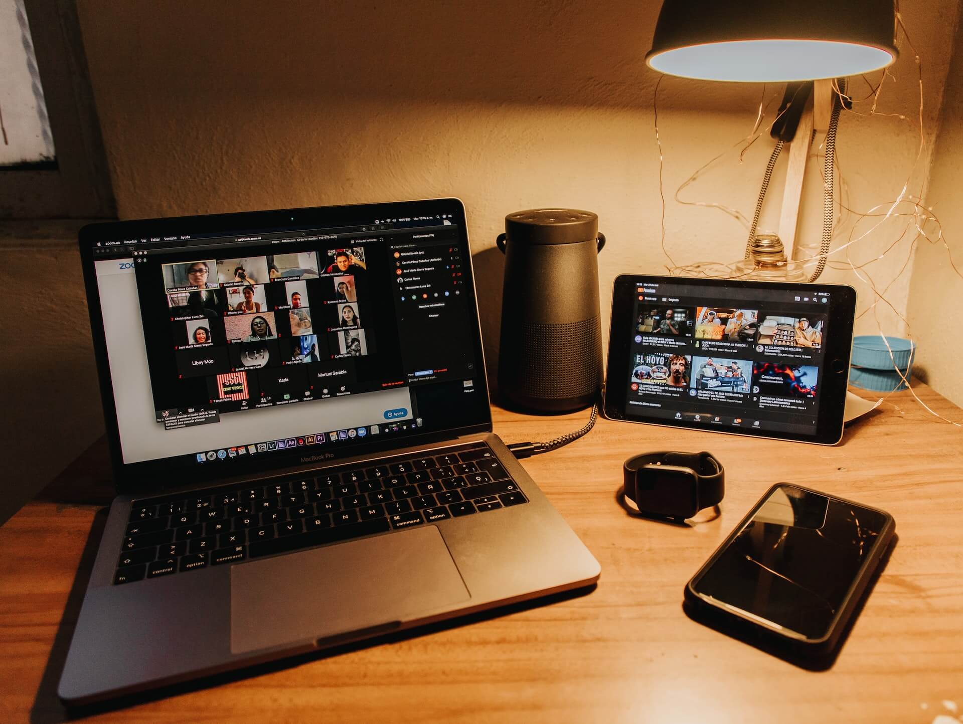 Laptop, tablet, phone, watch on a table