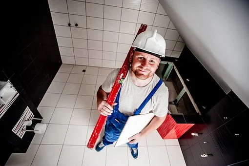 construction worker with a white hard hat