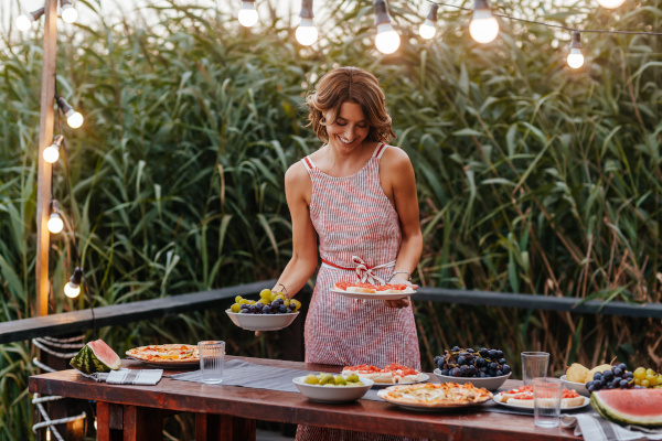 Person setting a table