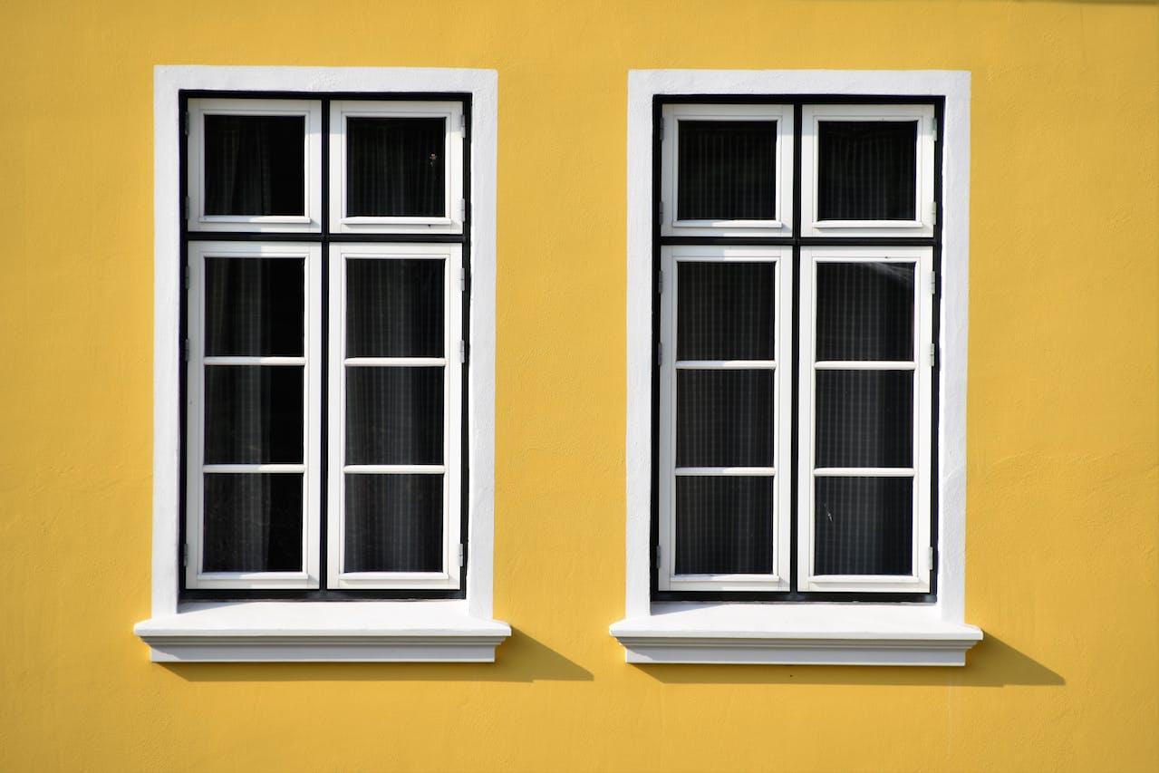 Yellow house with two windows