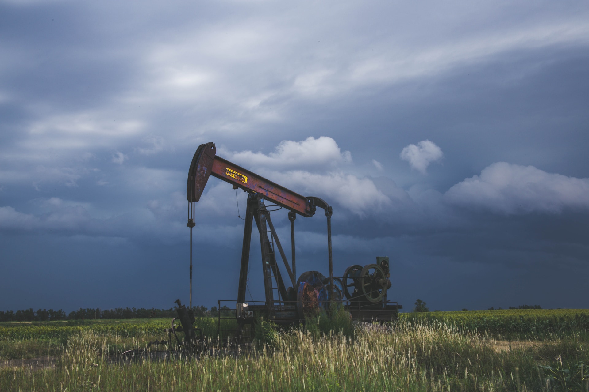 oilfield, dark, cloudy sky