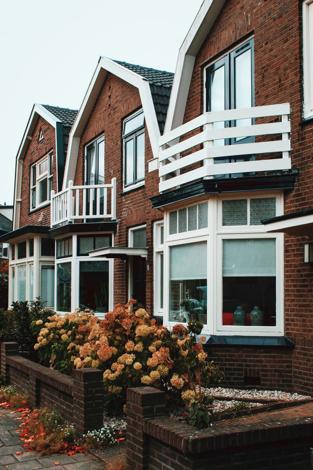 Boston multi-family rental property with tax documents for depreciation planning. Image by Pexels