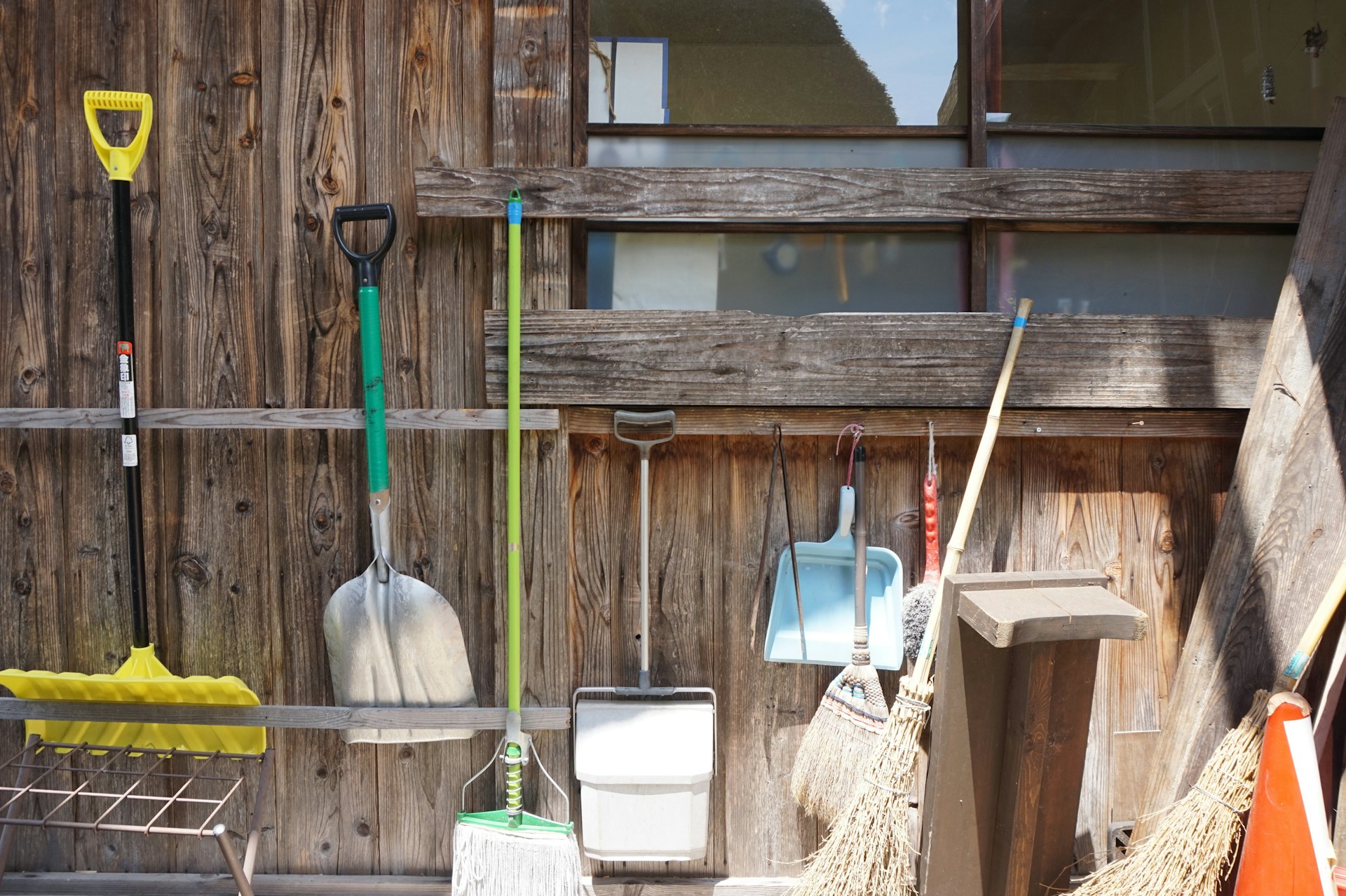 Gardening tools in a shed. Image by Unsplash