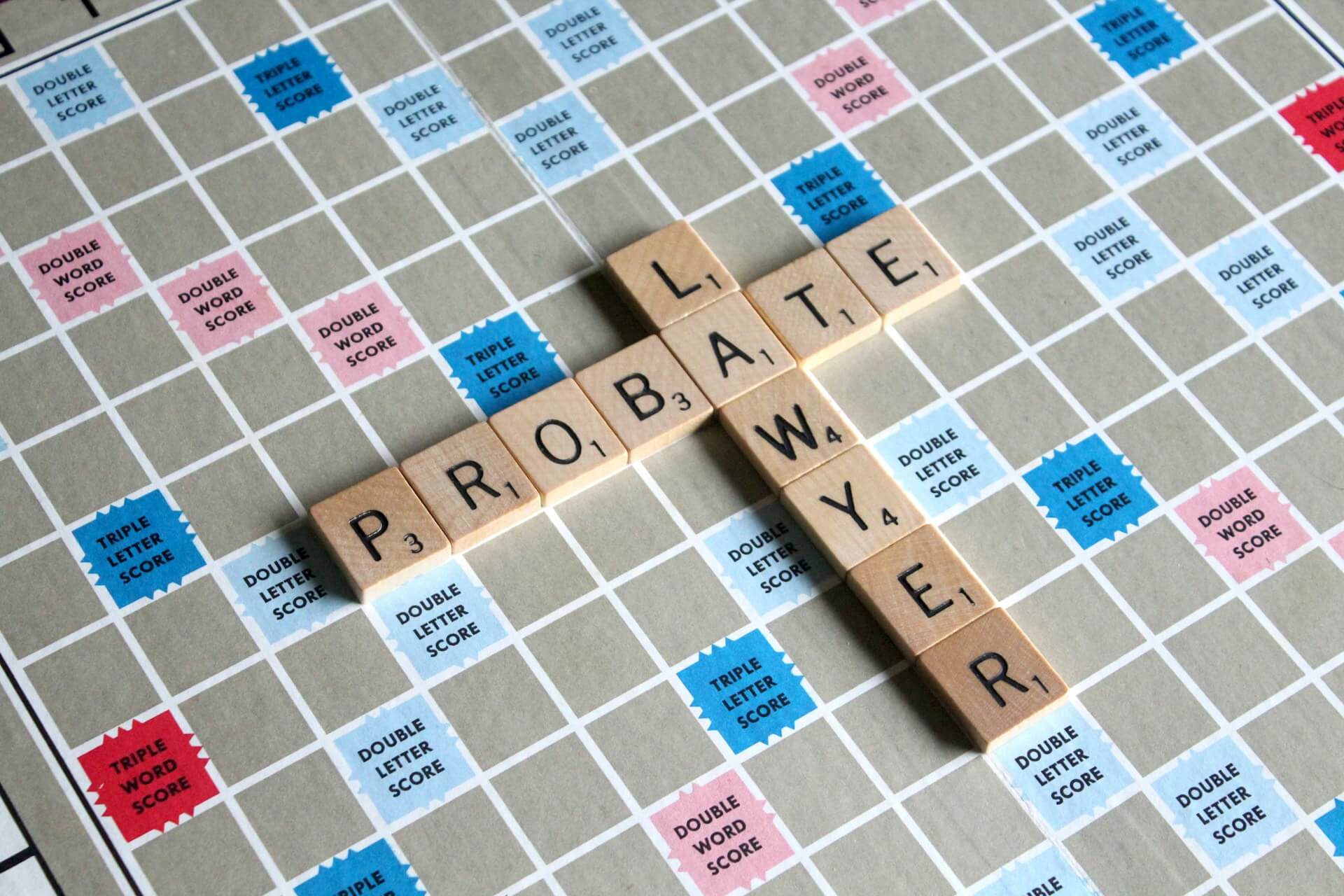 Scrabble game with the words LAWYER and PROBATE. Image by Unsplash